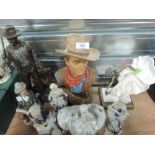 A selection of figures and figurines including John Wayne