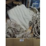 Three pairs of cream curtains with a thin delicate champagne stripe running through them, includes