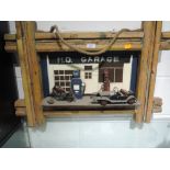 A wooden relief plaque depicting 1950's design garage and Morgan style car