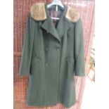A vintage 1960s ladies coat in bottle green wool with blonde mink collar, small to medium.