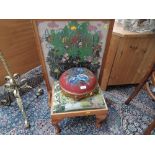 A Victorian beadwork footstool , a tapestry footstool and an oak firescreen