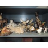 A selection of figures and figurines of various animals including Leonardo Donkey and Shebeg