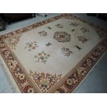 A large Oriental style carpet square