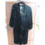 Vintage Black fur coat, approx 1930s. some light wear and small areas of damage. Around a medium