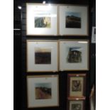 A selection of photographs in modern light oak frames