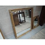 A gilt frame mirror of rectangular form