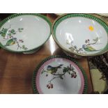 A selection of hand decorated plates with pierced rim and blue tit design
