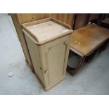 A stripped pine pot cupboard