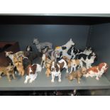 A selection of dog figures and figurines including Border fine arts