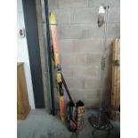 A set of skis, boots and poles