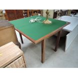 A vintage Beautility fold over card table , dated Dec 1970