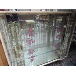 A mid 20th Century glass display cabinet