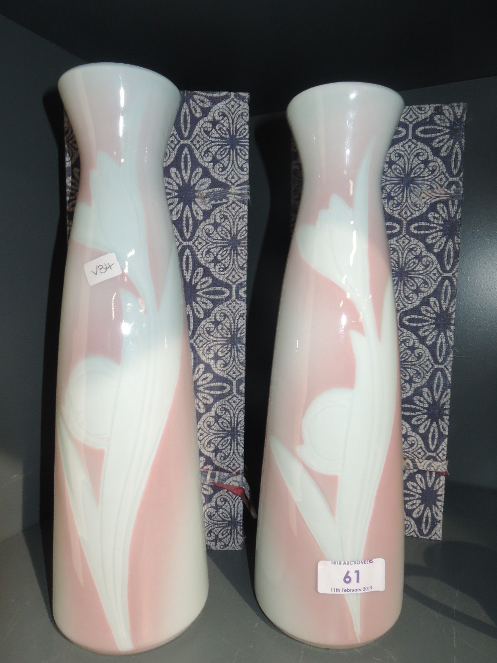 A pair of Chinese style vase bearing stamp to base with cases