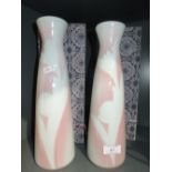 A pair of Chinese style vase bearing stamp to base with cases