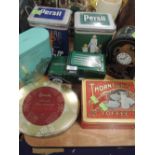 A selection of advertising tins including Persil