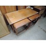 A vintage teak G plan style coffee table nest