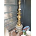 a heavy set brass bodied lamp with marble base