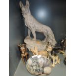 A selection of Alsation or German Shepherd dog figures and decorations