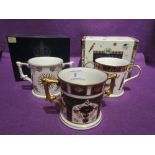 A selection of cabinet display cups by Royal Crown Derby including Autumnal Equinox no. 250-750