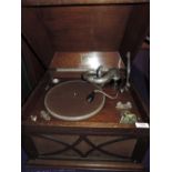 A vintage HMV gramophone in oak case