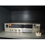 A vintage JV KG-V100 stereo cassette deck