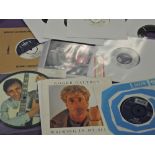 Who related lot of seven inch singles with signed Daltrey , rare John Entwistle and a Pete Townshend
