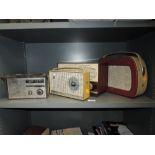 A selection of vintage radios, including transistor
