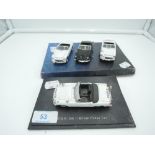 A selection of die cast model police cars