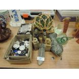 A selection of Ethnic carved stone figures and seal stamps also buttons and glass fishing float