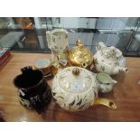 A selection of tea wares including Royal Worcester gold gilt tea set