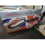 A Lewis Hamilton Scalextric race car set