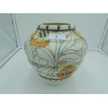 A Crown Ducal vase by Charlotte Rhead having typical floral tube line decoration, signed and