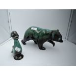 Two animal figures with green glaze including bear