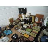 A selection of vintage cigar cigarette and tobacco smokers advertising tins, humidors and