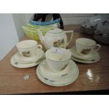 A child's ceramic tea set with Little Jack Horner nursery rhyme print