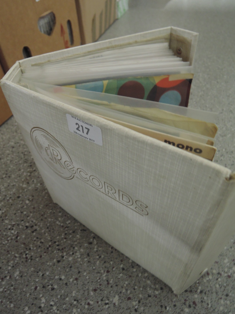 Book style holder with 60's seven inch singles