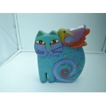 A brightly decorated cat figure or figurine from the Laurel Burch collection