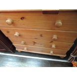 A modern pine chest of drawers