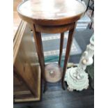 An early 20th Century mahogany plant stand