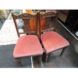 A pair of late Victorian dining chairs