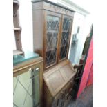 A mid 20th Century oak bureau bookcase