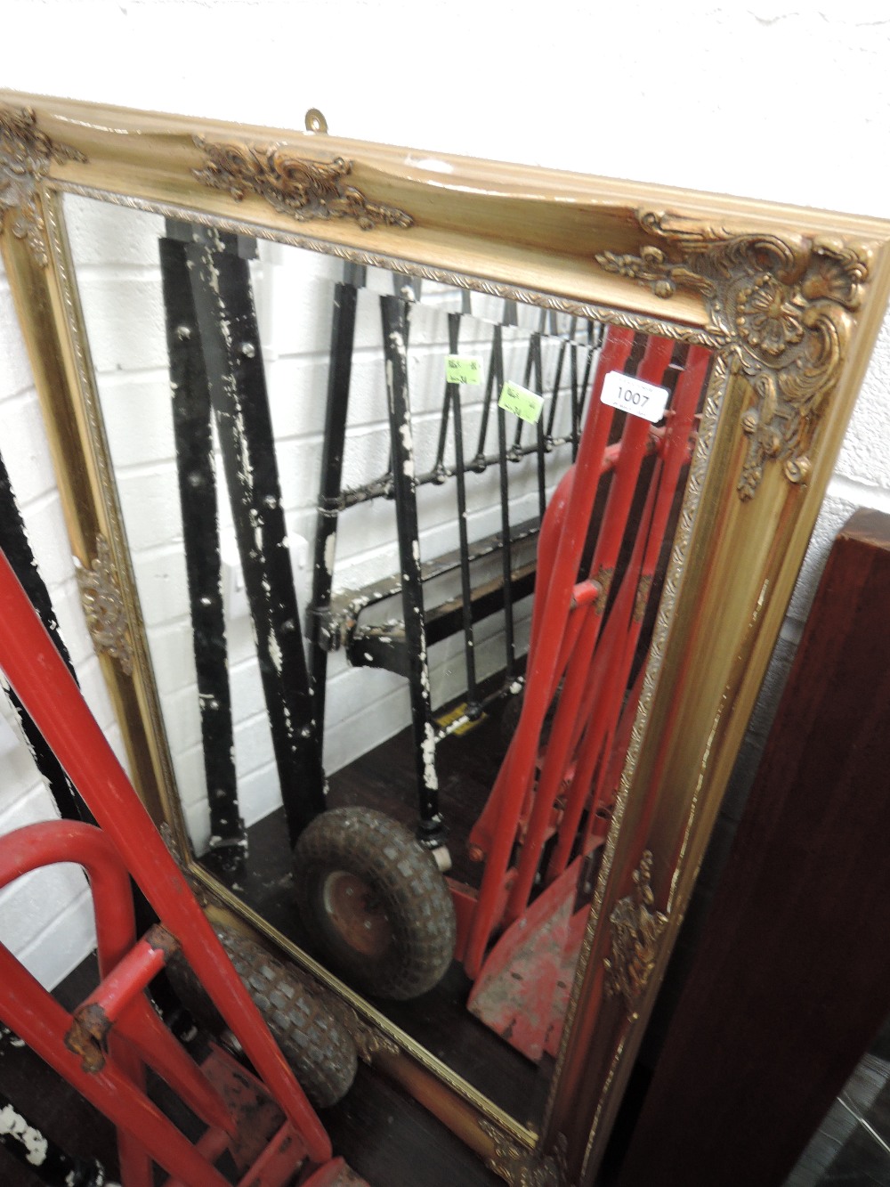 A modern gilt frame mirror in the classical style