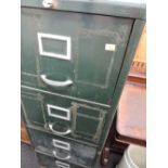 A vintage metal filing cabinet