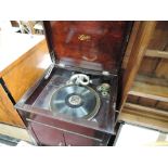 A vintage Selecta gramophone in oak cabinet