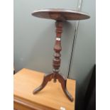 A Victorian mahogany occasional pedestal table