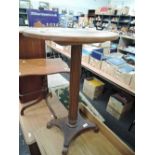 A period style composite pedestal table