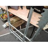 A folding metal saw bench