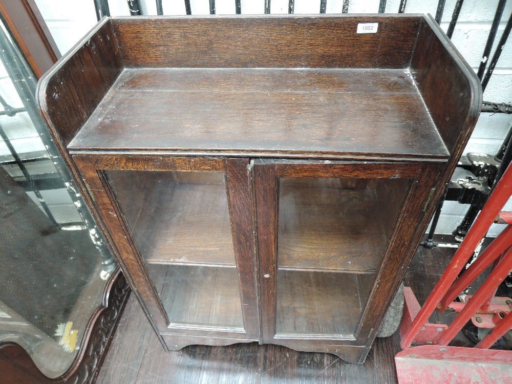 An early 20th Century oak low bookcase