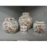 A selection of graduated ginger jars by Masons