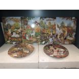 A selection of display plates and ceramic wall tiles with cat and kitten imagery